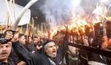 Shi'ite Muslims gather ahead of Ashura, the holiest day on the Shi'ite Muslim calendar, in Najaf