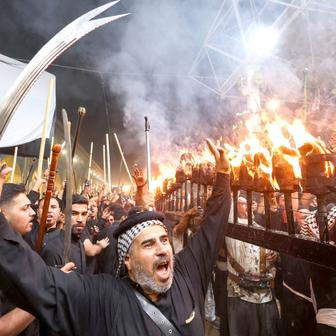 Shi'ite Muslims gather ahead of Ashura, the holiest day on the Shi'ite Muslim calendar, in Najaf