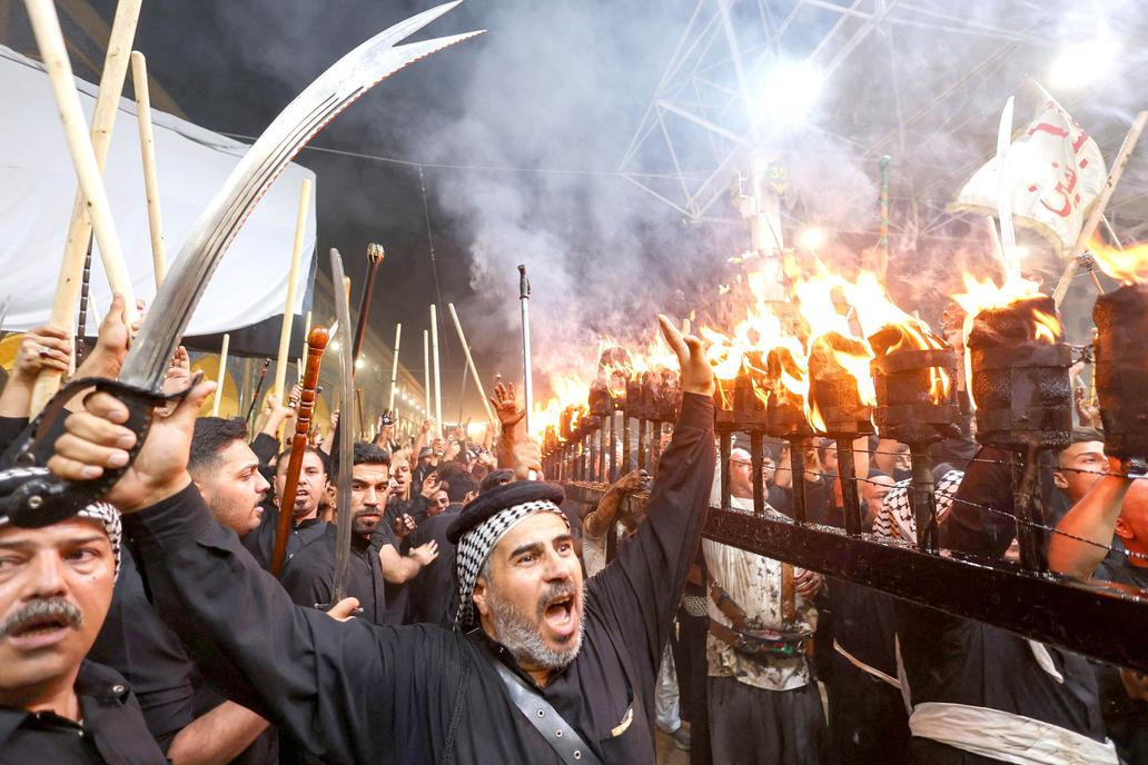 Shi'ite Muslims gather ahead of Ashura, the holiest day on the Shi'ite Muslim calendar, in Najaf