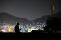 FILE PHOTO: A man on a video call in Kabul, Afghanistan,