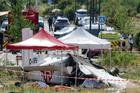 French rescuers work at the site of a plane crash, in Tomblaine