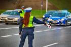 11.08.2023,Wroclaw,,Poland,,A,Policewoman,With,A,Lollipop,Stops,Vehicles