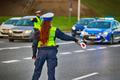 11.08.2023,Wroclaw,,Poland,,A,Policewoman,With,A,Lollipop,Stops,Vehicles