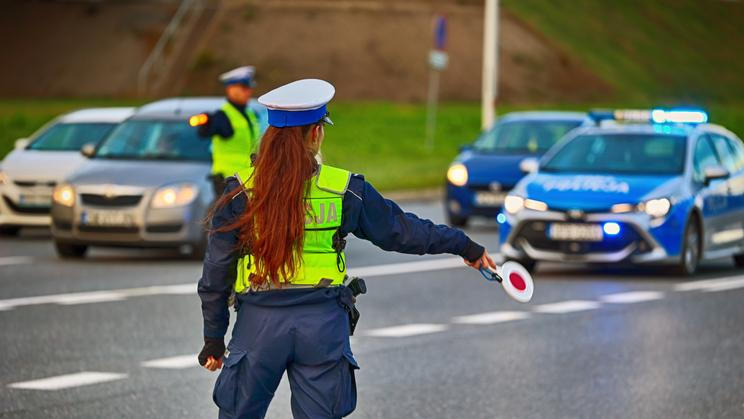 11.08.2023,Wroclaw,,Poland,,A,Policewoman,With,A,Lollipop,Stops,Vehicles