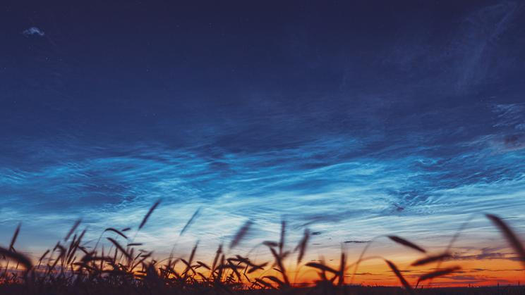 Night,Starry,Sky,With,Glowing,Stars,Above,Countryside,Landscape.,Noctilucent