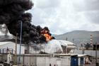 A blaze after Israel's Fire and Rescue Service said that an industrial building and a fuel tanker at Israel's Oil Refineries were hit by debris from an intercepted Iranian missile, in Haifa