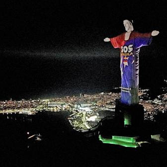 Images are projected on Christ the Redeemer statue in tribute to victims of earthquakes that struck Venezuela on June 24, in Rio de Janeiro