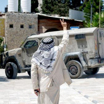 Israeli settlers and troops at the archaeological site of Sebastia