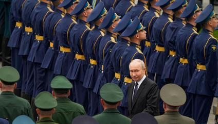 Russian President Putin attends a wreath-laying ceremony in Moscow