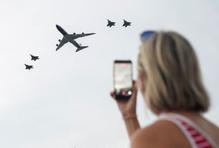 Air Force One flies over the National Mall as part of Fourth of July celebrations