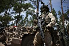 Polish and Lithuanian soldiers during the Bursztynowy Obronca-26 (Amber Defender-26) military excersise at the Klusy training ground