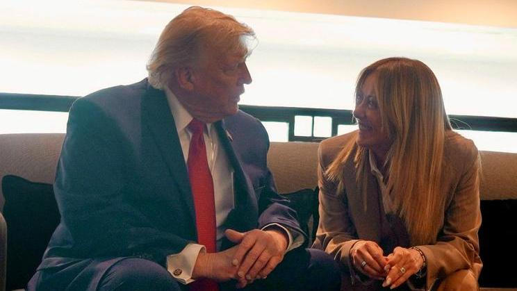 U.S. President Donald Trump speaks to Italian Prime Minister Giorgia Meloni on the sidelines of G7 summit