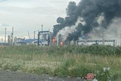 Fire at Omsk oil refinery as the region's governor says the province came under attack from Ukrainian drones