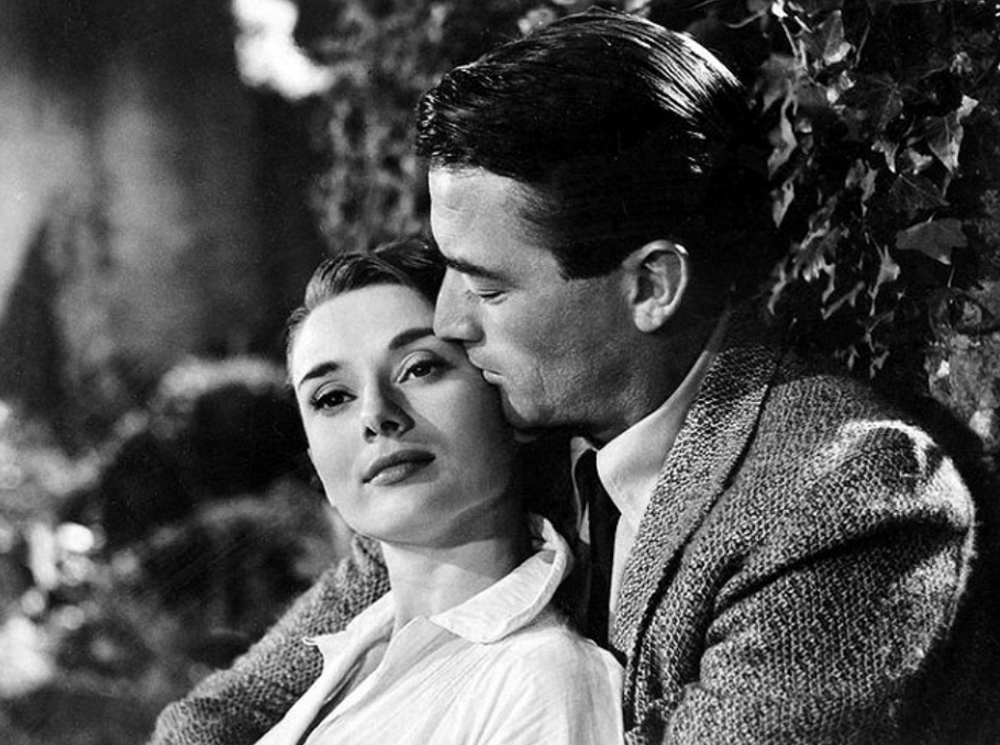 Audrey Hepburnová a Gregory Peck ve filmu Prázdniny v Římě.