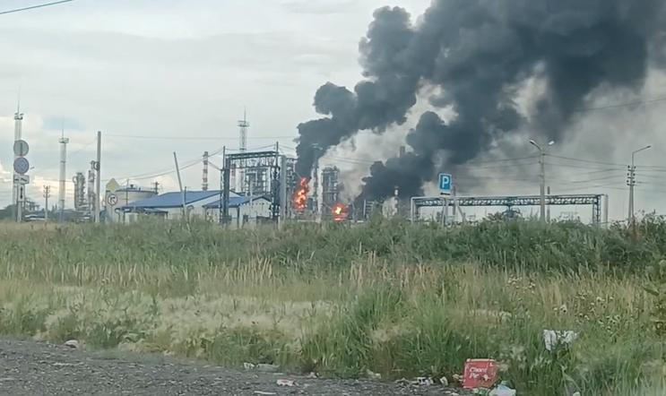 Fire at Omsk oil refinery as the region's governor says the province came under attack from Ukrainian drones