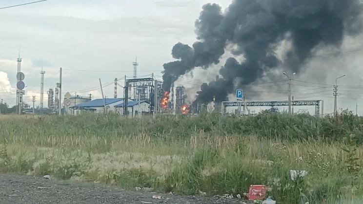 Fire at Omsk oil refinery as the region's governor says the province came under attack from Ukrainian drones