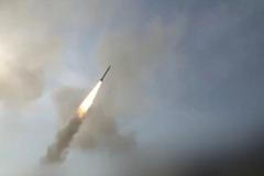 Screengrab from an Iranian state TV video says to show an Iranian missile flying through the air at an unknown location