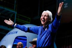FILE PHOTO: Wally Funk reacts after receiving her astronaut's wings from Blue Origin's Jeff Ashby, a former space shuttle commander at a post-launch press conference, in the nearby town of Van Horn