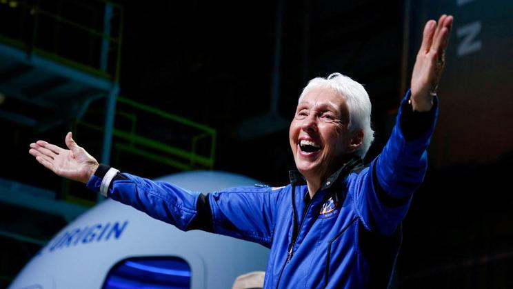 FILE PHOTO: Wally Funk reacts after receiving her astronaut's wings from Blue Origin's Jeff Ashby, a former space shuttle commander at a post-launch press conference, in the nearby town of Van Horn