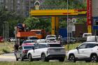 FILE PHOTO: Cars queue to refuel at a petrol station in Rostov-on-Don