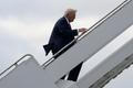 FILE PHOTO: U.S. President Donald Trump boards Air Force One at Palm Beach International Airport in West Palm Beach