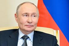 Russian President Vladimir Putin meets with Uzbek President Shavkat Mirziyoyev in Strelna