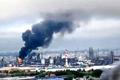 Smoke rises following what the authorities say is a Ukrainian drone strike in Moscow