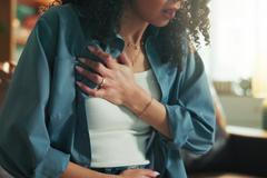Chest,Pain,,Emergency,And,Fear,With,Hands,Of,Woman,For