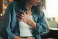 Chest,Pain,,Emergency,And,Fear,With,Hands,Of,Woman,For