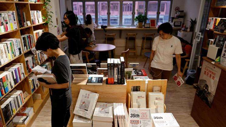 FILE PHOTO: People are seen inside at the independent bookstore 'Have A Nice Stay' in Hong Kong