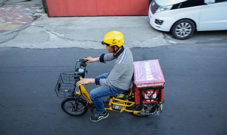 Harbin,,China,-,June,23,,2019:,Food,Delivery,Man,Driving