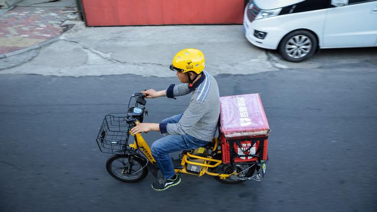 Harbin,,China,-,June,23,,2019:,Food,Delivery,Man,Driving