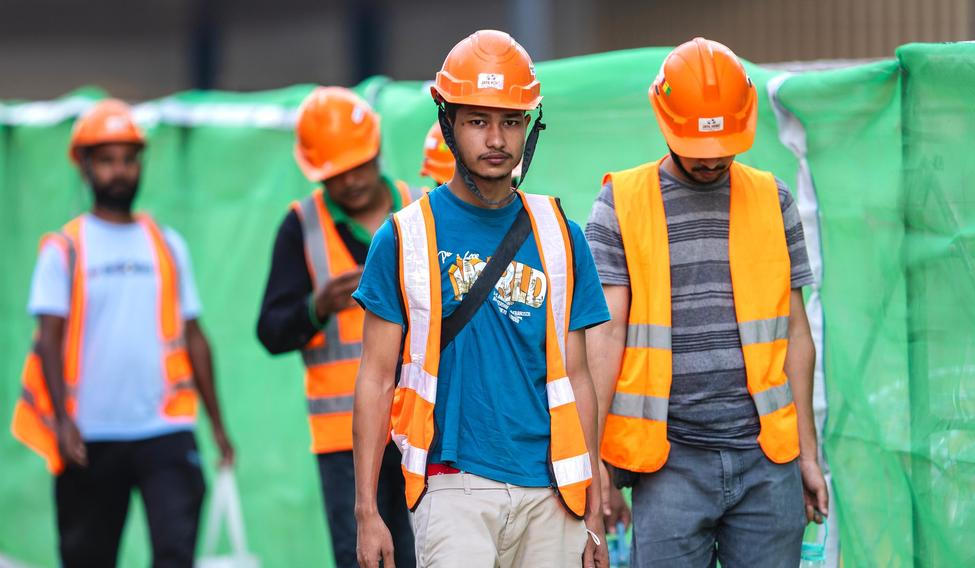 Kuala,Lumpur,,Malaysia,-,July,27,,2024:,Foreign,Workers,Wearing