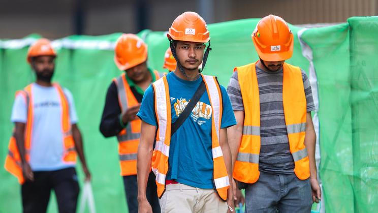 Kuala,Lumpur,,Malaysia,-,July,27,,2024:,Foreign,Workers,Wearing