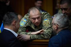 FILE PHOTO: Commander in Chief of the Ukrainian Armed Forces Colonel General Syrskyi speaks with lawmakers during a parliament session in Kyiv