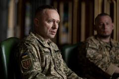 FILE PHOTO: Major general Drapatyi meets with  Ukraine's President Zelenskiy in Kyiv