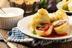 Dumplings,With,Plums,,Topped,With,Plum,Sauce,Or,Served,With