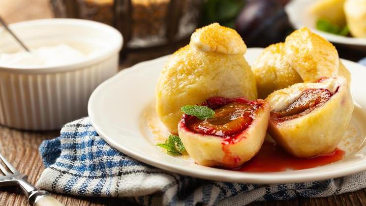 Dumplings,With,Plums,,Topped,With,Plum,Sauce,Or,Served,With