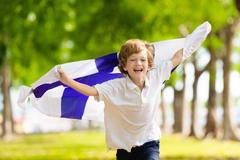 Child,Running,With,Finland,Flag.,Little,Finnish,Boy,Cheering,For