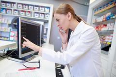 Female pharmacist seeking advice online 
