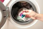 Hand,Holding,Gel,Caps,For,Washing,Machine.,Household,Laundry,Equipment.