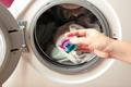 Hand,Holding,Gel,Caps,For,Washing,Machine.,Household,Laundry,Equipment.