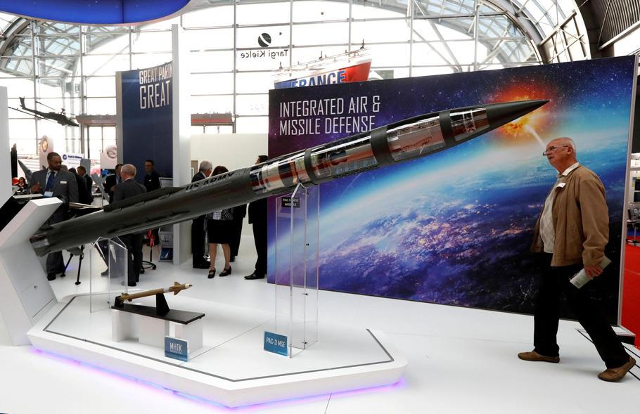 FILE PHOTO: A man looks at a Patriot Advanced Capability (PAC-3) Missile Segment Enhancement (MSE) model by Lockheed Martin at an international military fair in Kielce