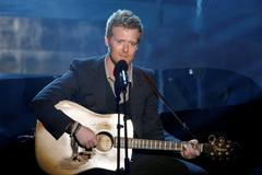 FILE PHOTO: Glen Hansard performs "Falling Slowly" during the 80th annual Academy Awards in Hollywood