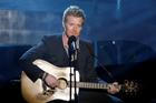 FILE PHOTO: Glen Hansard performs "Falling Slowly" during the 80th annual Academy Awards in Hollywood