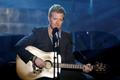 FILE PHOTO: Glen Hansard performs "Falling Slowly" during the 80th annual Academy Awards in Hollywood