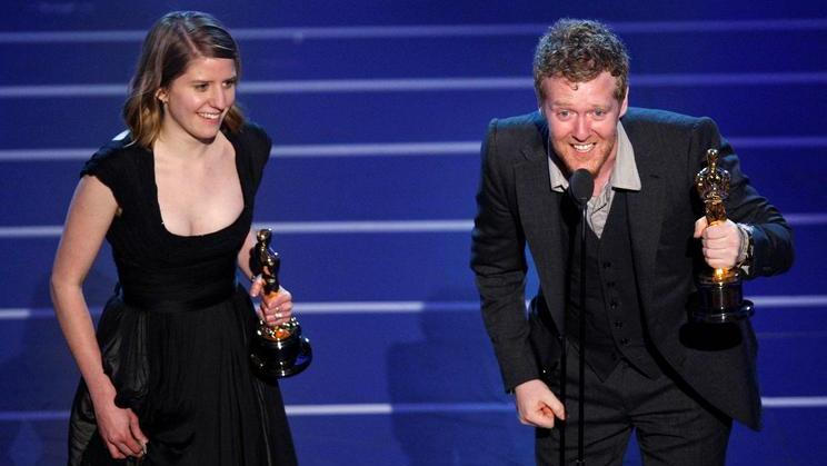 FILE PHOTO: Glen Hansard and Marketa Irglova accept the Oscar for the best original song "Falling Slowly" during the 80th annual Academy Awards in Hollywood