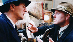 Bolek Polívka a Jaroslav Dušek ve filmu Jana Hřebejka Musíme si pomáhat (2000).