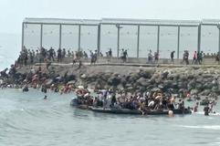 Migrants swim to Spain's Ceuta in mass border crossing