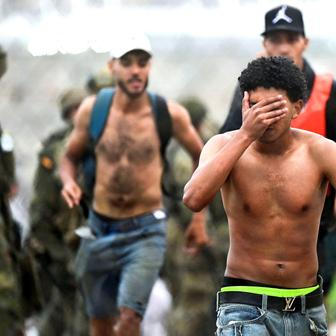 Migrants from Morocco arrive at the Spanish border in Ceuta